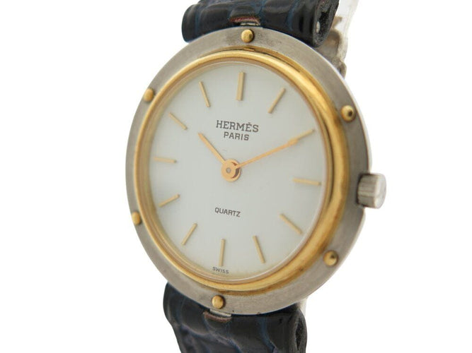 Montre vintage montre HERMES clipper 26 mm en or 18k et acier quartz  lady 58 Facettes 268714