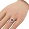 Bague 50 Bague marguerite en or blanc 18 carats, rubis et diamants 58 Facettes