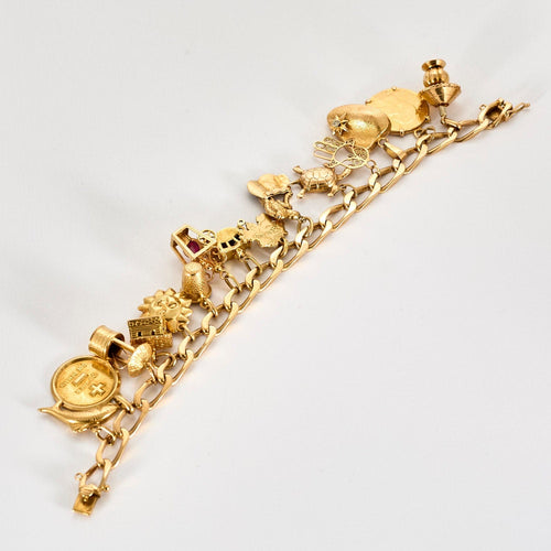 Bracelet Bracelet en or jaune à pampilles 58 Facettes COL3226