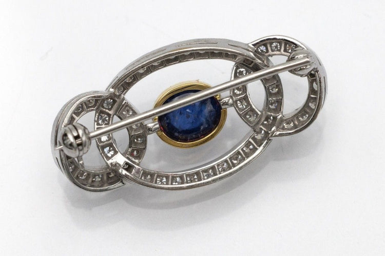 Broche Broche Art Déco saphir cabochon et diamants en or blanc 18k 58 Facettes 10835