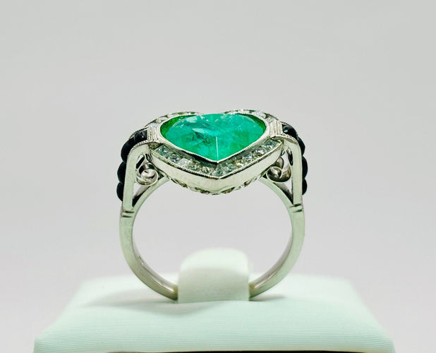 Bague 53 Bague en platine avec une émeraude, des diamants et de l'onyx 58 Facettes 50280