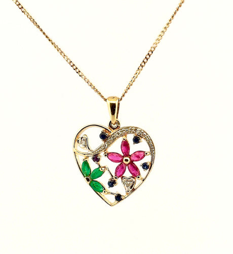 Collier Collier en or et pierres précieuses 58 Facettes