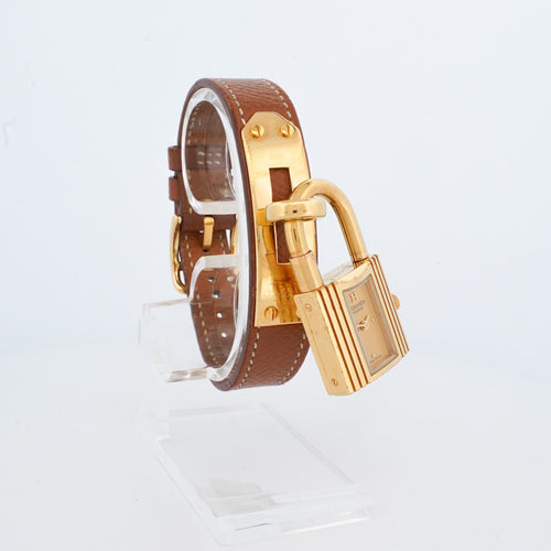 Montre Hermès - Montre Kelly cadran champagne en acier doré et verre saphir 58 Facettes