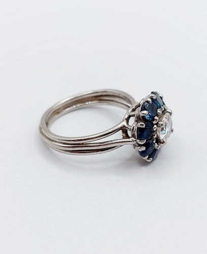 Bague 52 Bague marguerite Art déco en platine et diamant 0,65 ct, saphirs 58 Facettes A06577