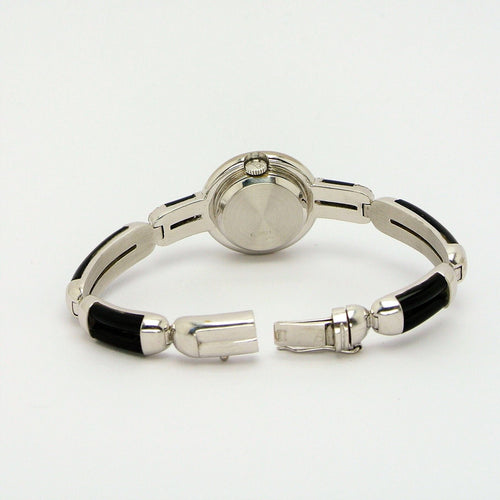 Montre Montre Chopard Genève en or blanc 18 carats avec onyx et diamants 58 Facettes