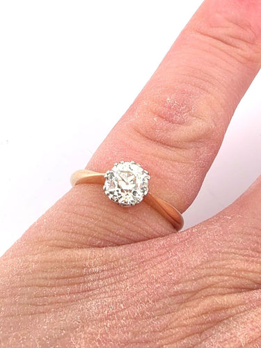 Solitaire en platine et or jaune 18 carats serti d'un diamant ancien de 1,50 carat