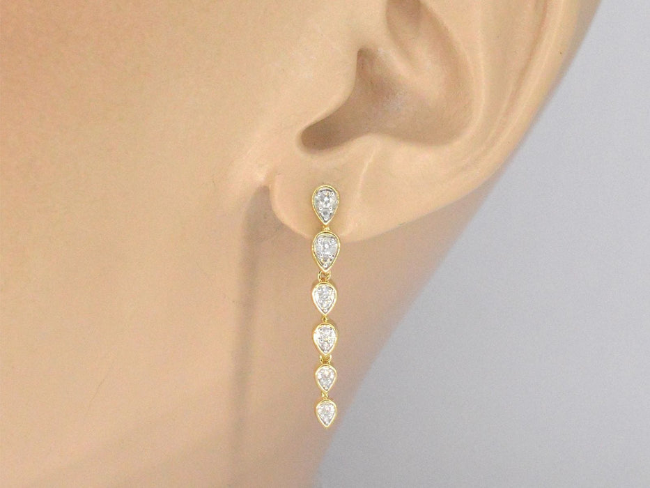 Boucles d'oreilles en or jaune avec diamants