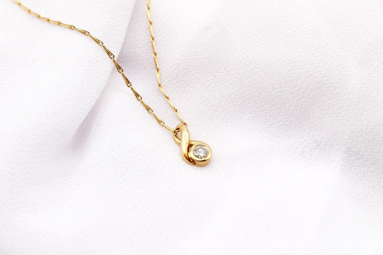 Pendentif Pendentif boucle or jaune diamant 58 Facettes 250437