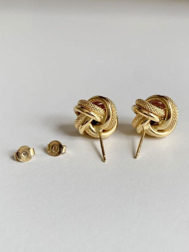 Boucles d'oreilles Boucles d'oreilles nœud en or 18K 58 Facettes
