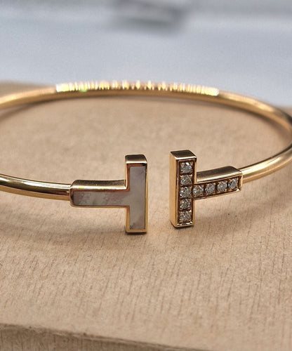 Tiffany & Co. - Bracelet T - Collection Wire en or rose