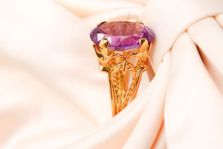 Bague Bague or jaune motif corde sertie d’une améthyste 58 Facettes 250317