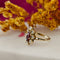 Bague Bague marguerite or jaune grenat diamants 58 Facettes MG3