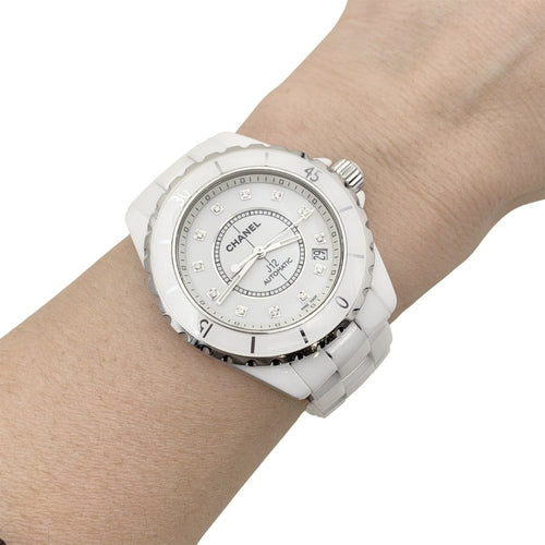 Montre Montre Chanel, "J12", céramique blanche, diamants. 58 Facettes 35200