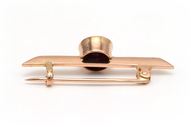 Broche Broche Napoléon III en or rose sertie d'un grenat 58 Facettes B265