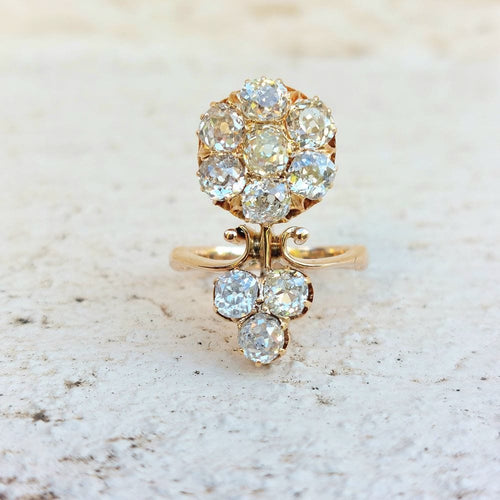 Bague 49 Bague fleur en or jaune et diamants 58 Facettes 154