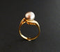 Ring 63 Ring set with a Tahitian Pearl and Diamonds 58 Facettes