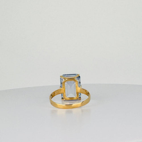 Bague Bague en or jaune 14 carats avec topaze bleue taille émeraude de 2 carats 58 Facettes 2508099
