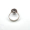 Bague vintage en or blanc 18 carats avec centre et bordure sertie de saphirs et de diamants