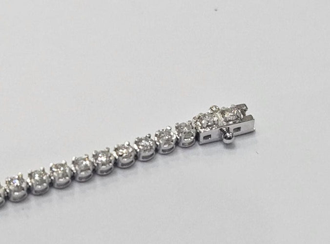 Bracelet Bracelet tennis en or blanc, diamant 2,46 ct, serti griffes tournées 58 Facettes Q399B
