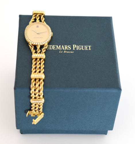Montre Audemars Piguet - Montre joaillerie femme or jaune & diamants, 1981 58 Facettes AP-100