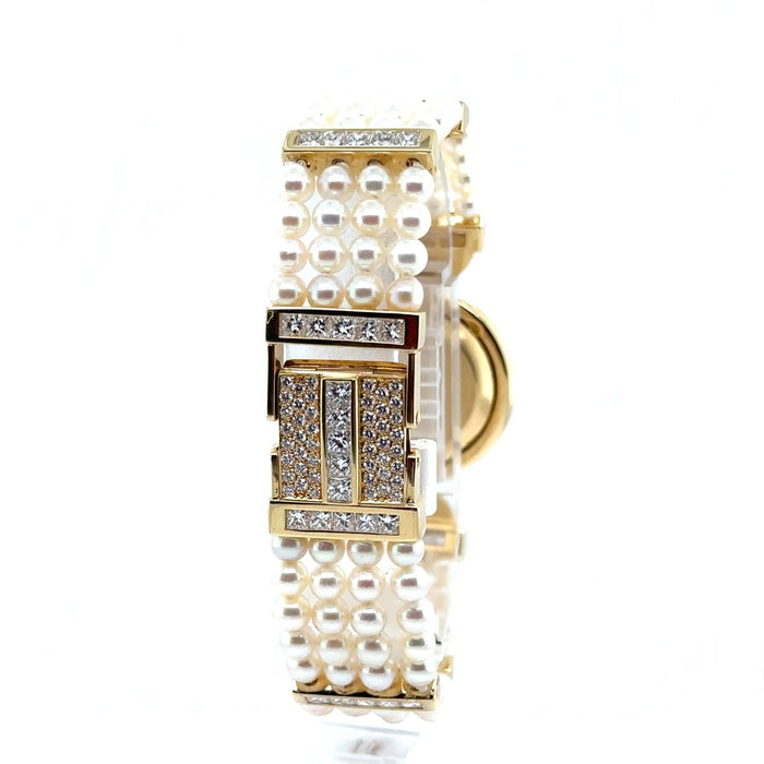 Montre Baskania - Montre femme or jaune - perles de culture et diamants 58 Facettes 1.0000135/4