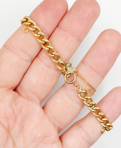 Bracelet Bracelet vintage or jaune maille gourmette et 2 anneaux pour charm 58 Facettes A06355