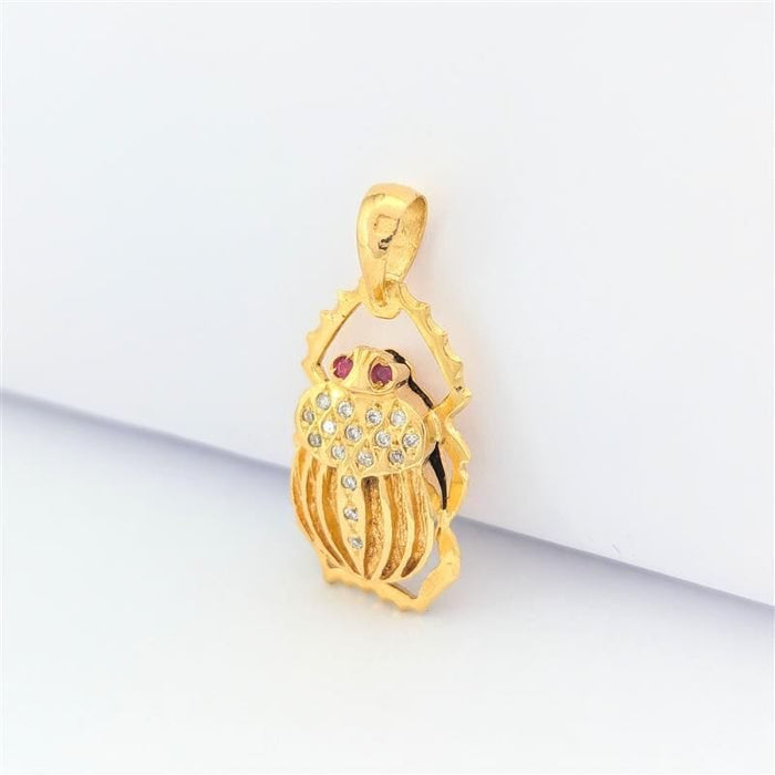 Pendentif Pendentif animalier en or jaune diamants et rubis 58 Facettes 30487