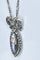 Collier Pendentif et sa chaine en argent : enfant sur email et pierres blanches. Vers 1900 58 Facettes AB386