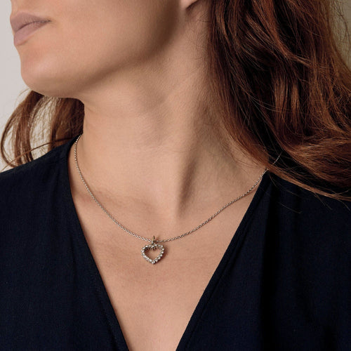 Collier Chaîne en or blanc et pendentif coeur diamants 58 Facettes ARL0760