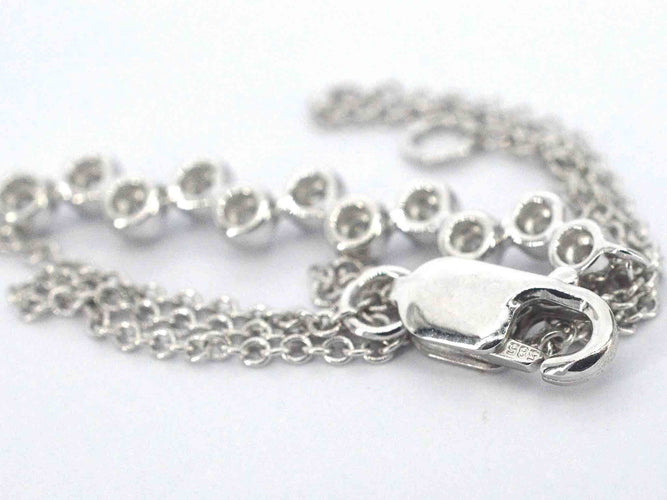 Bracelet Bracelet en or blanc avec diamants 58 Facettes 2360
