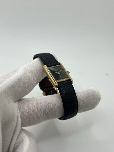 Montre Cartier - Montre Tank Must Vermeil cadran noir 20 x 28 mm 58 Facettes