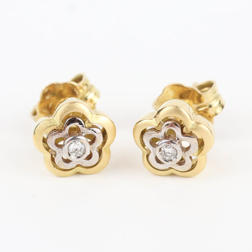 Boucles d'oreilles Boucles d'oreilles en forme de fleur en or jaune et blanc 18 carats avec diamants 58 Facettes 131208