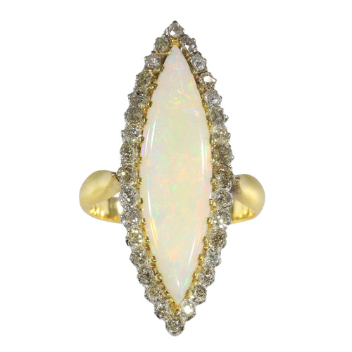 Bague 55 L'élégance victorienne : le chef-d'œuvre de la bague en opale et diamant de 1880 58 Facettes 16054-0031