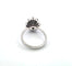 Bague 53 Bague en or blanc avec diamant central et diamants environnants 58 Facettes