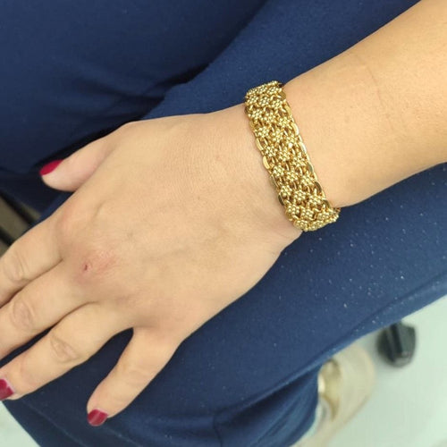 Bracelet Bracelet maille tressée en or jaune 18 kt 58 Facettes BR111