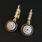 Boucles d'oreilles Art Déco Diamants et Saphirs Calibrés