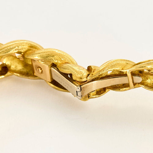 HERMES - Bracelet jonc en or jaune a motif de cheval