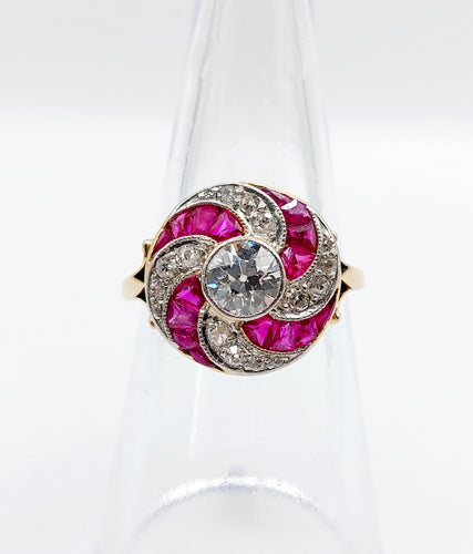 Bague 52.5 Bague cible tourbillon art deco or jaune diamant et rubis calibrés 58 Facettes A04892