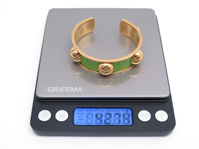 Bracelet bracelet HERMES jonc en cuir vert et metal dore en metal 58 Facettes 272252