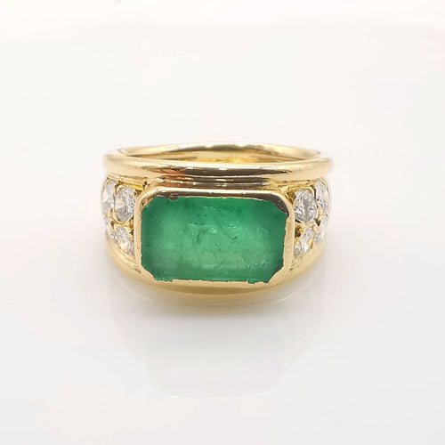 Bague 58 Bague en or jaune, émeraude et diamants 58 Facettes