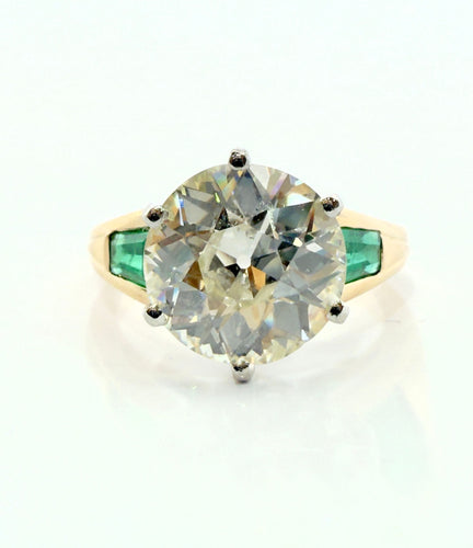 Bague 52 Solitaire en or et platine , diamant 3,85 carats , émeraudes 58 Facettes