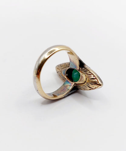Bague 44 Bague marquise antique or jaune et platine, émeraude et diamants (circa 1920) 58 Facettes A06384