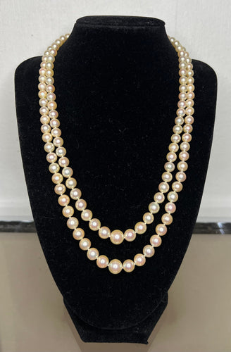 Collier Collier double rangs 132 perles de culture fermoir fleur en or jaune 58 Facettes