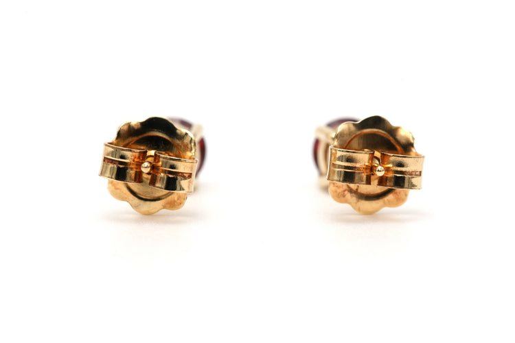 Boucles d'oreilles Boucles d'oreilles contemporaines serties de grenats en or jaune 18 carats 58 Facettes B789
