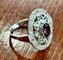 Bague 53 Bague Art Déco en platine sertie de rubis et de diamants (1,52 ct), ornée d'un motif en grappe. 58 Facettes Q407B