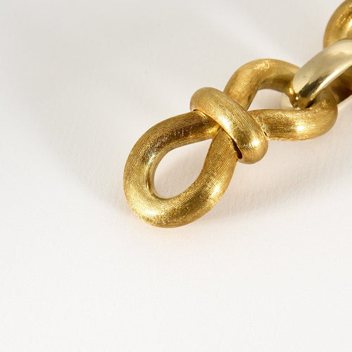 Bracelet souple en or jaune brossé et or gris