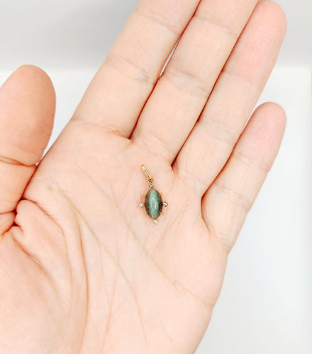 Pendentif Pendentif antique cabochon agate œil de chat en or rose 18k et diamants 58 Facettes A06512