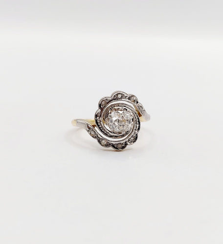 Bague 43 Bague tourbillon antique en or 18k et platine, diamant ancien 0,30 ct et roses 58 Facettes A06352