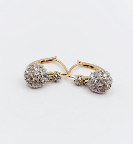 Boucles d'oreilles Dormeuses marguerite - Boucles d’oreilles en or 18k, platine et diamants 58 Facettes A06632