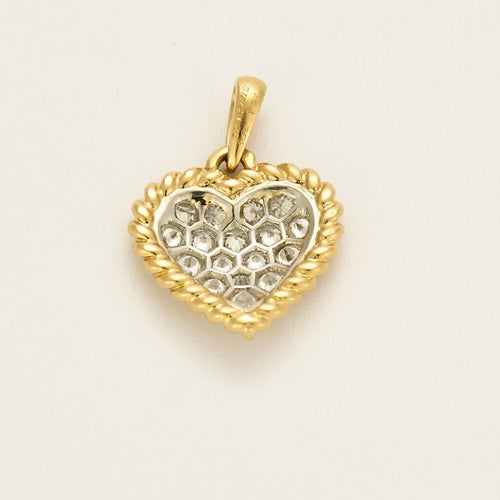 Pendentif Pendentif vintage de la maison Van Cleef & Arpels, de forme coeur en or jaune et diamants 58 Facettes MB6